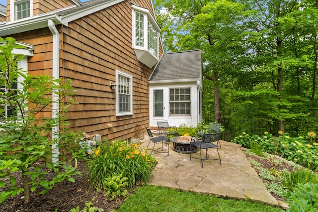 view of patio / terrace with a fire pit