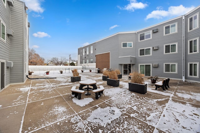 view of snow covered patio