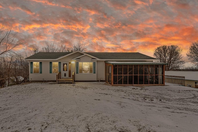 ranch-style home with a sunroom