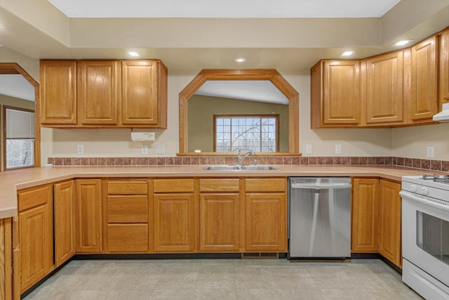 kitchen featuring stainless steel dishwasher, white range with gas stovetop, and sink