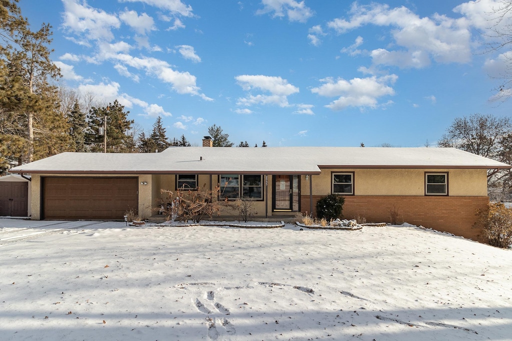 single story home with a garage