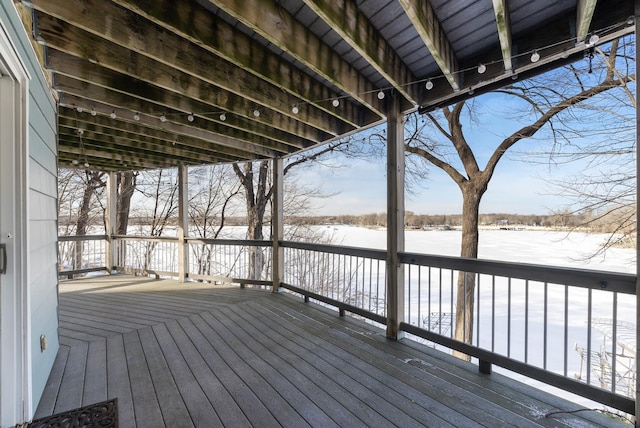 view of snow covered deck