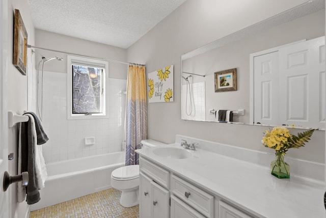 full bath with vanity, shower / bath combination with curtain, toilet, and a textured ceiling