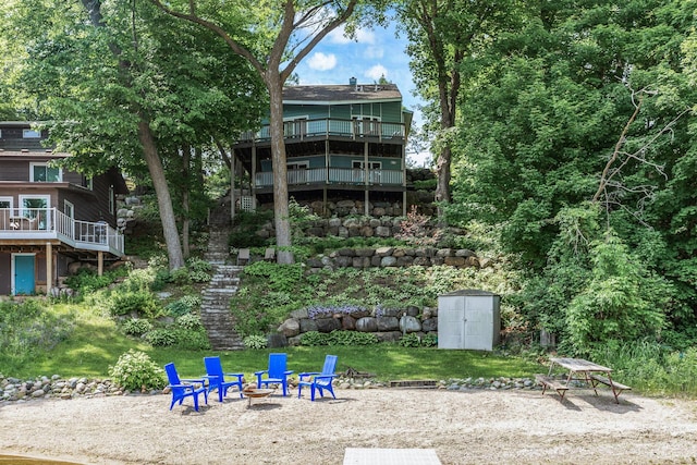 16164 Lakeside Ave SE, Prior Lake, MN 55372 - back of property featuring stairway, an outdoor fire pit, and a balcony