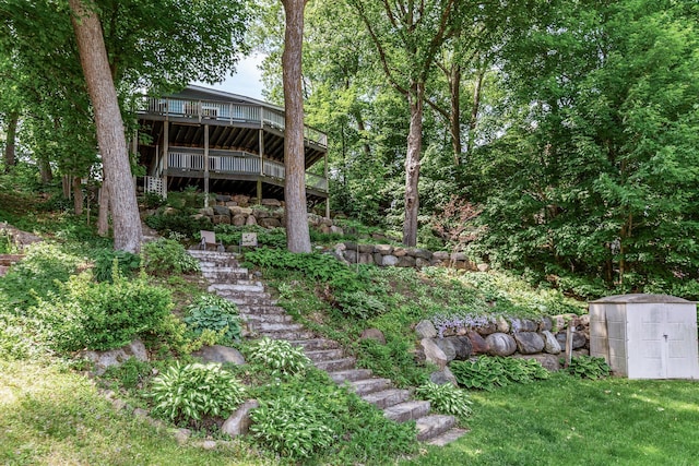 16164 Lakeside Ave SE, Prior Lake, MN 55372 - view of yard with a wooden deck and stairs