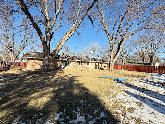 view of yard covered in snow