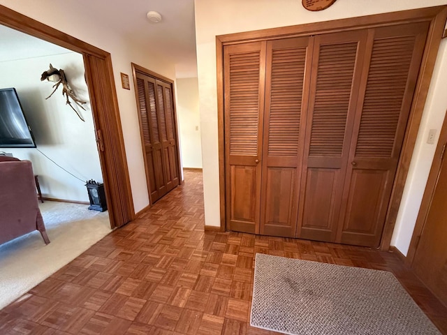 hallway with light parquet floors