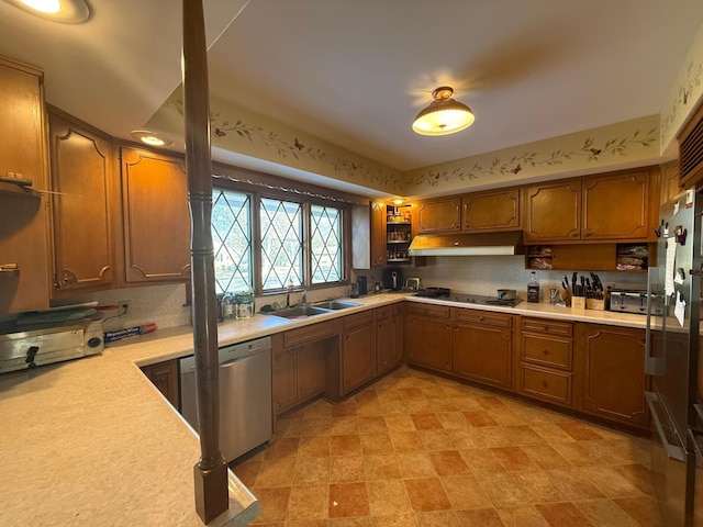 kitchen with sink and stainless steel appliances