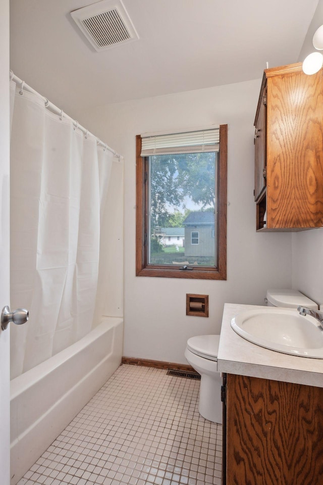 full bathroom with toilet, tile patterned flooring, shower / bath combination with curtain, and vanity