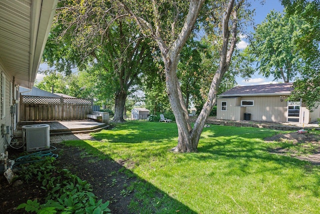 view of yard with central AC unit