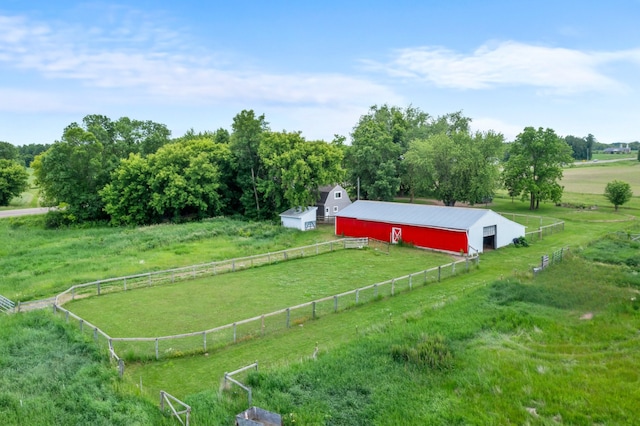 2021 Main St S, Pine City Twp, MN 55063 - view of yard featuring a rural view, a pole building, a garage, and an outdoor structure