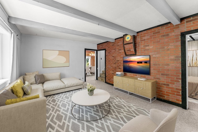 2021 Main St S, Pine City Twp, MN 55063 - carpeted living area featuring beam ceiling and brick wall