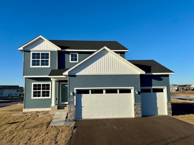 craftsman-style house with a garage