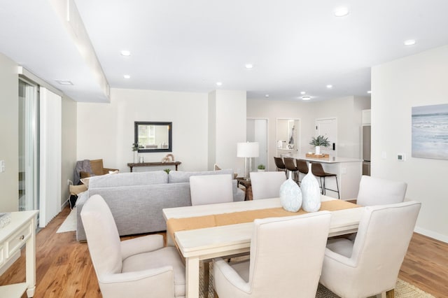 dining room featuring light hardwood / wood-style floors