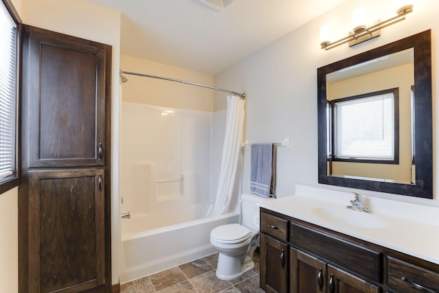 full bathroom with toilet, shower / bath combo, and vanity