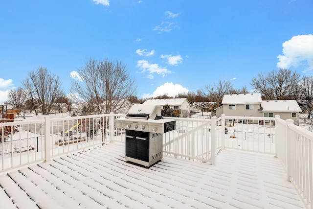 view of snow covered deck