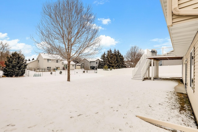 view of yard covered in snow