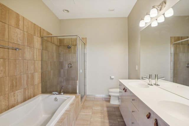 full bathroom featuring toilet, vanity, tile patterned floors, and shower with separate bathtub