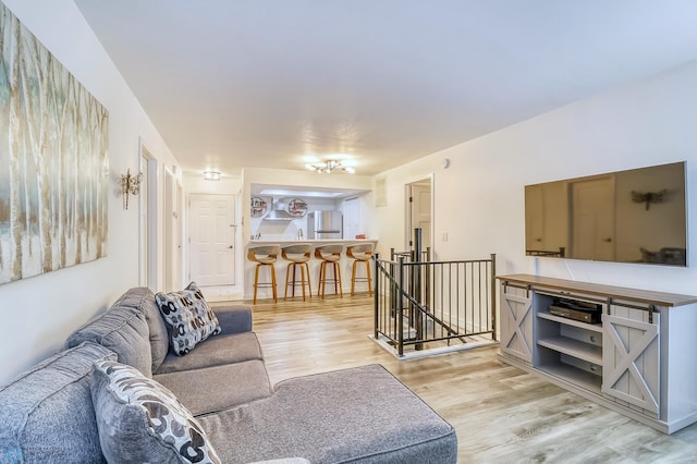 living room featuring light wood-type flooring