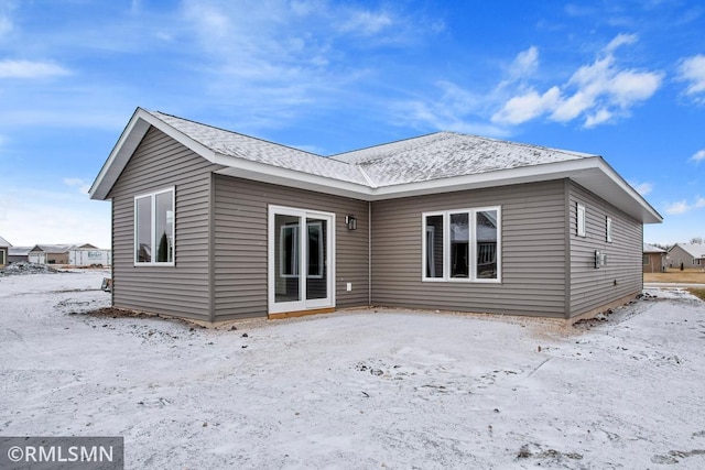 view of snow covered property