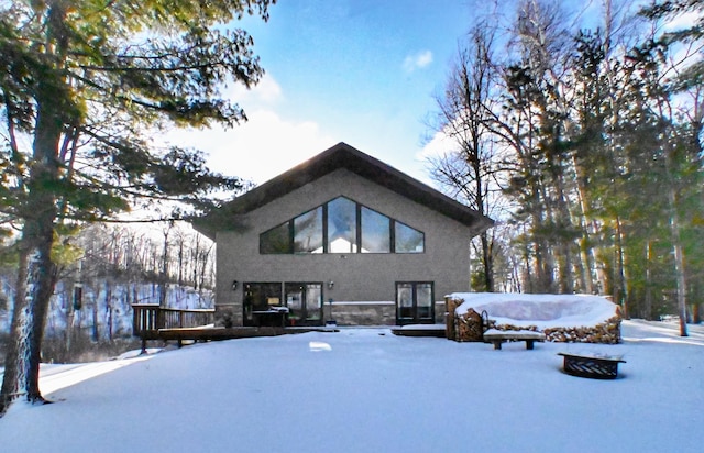 view of snow covered property