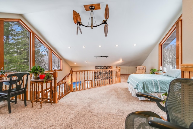 carpeted bedroom featuring vaulted ceiling