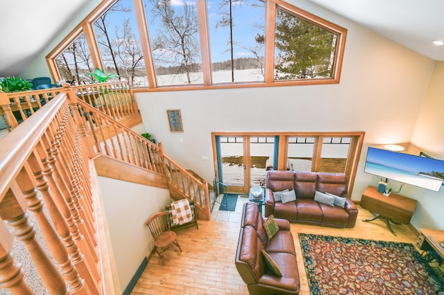 living room with a towering ceiling