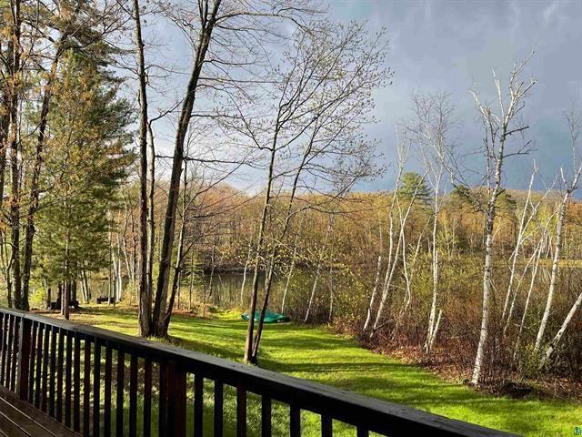 deck featuring a lawn