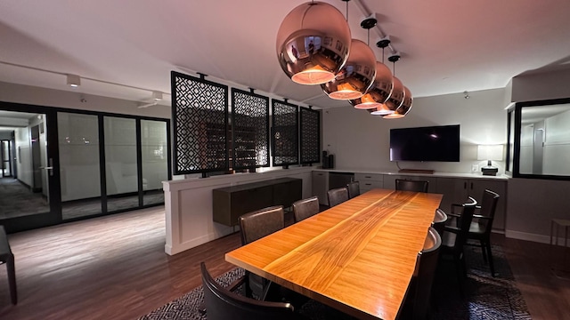 dining space featuring hardwood / wood-style floors