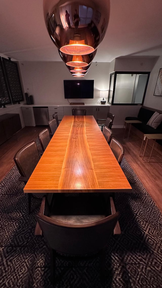 dining area featuring wood-type flooring