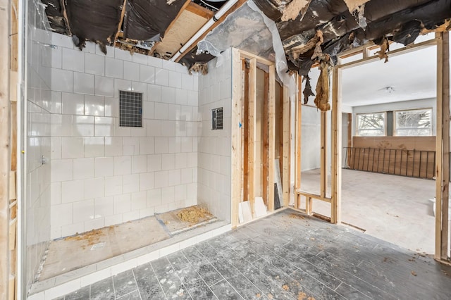 bathroom with hardwood / wood-style floors