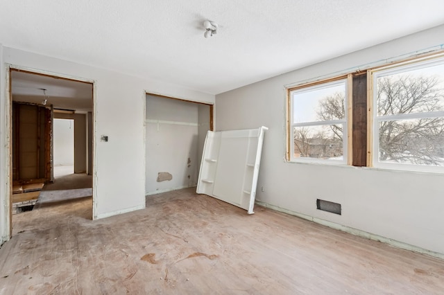 unfurnished bedroom featuring a closet