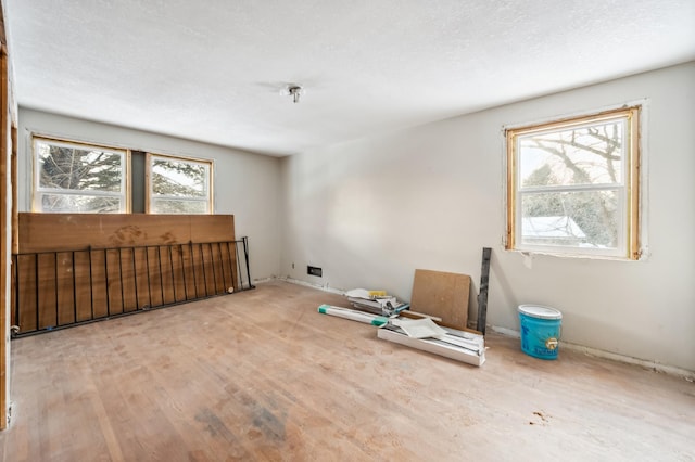 spare room featuring light wood-type flooring