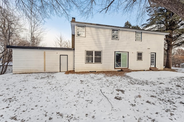 view of snow covered property