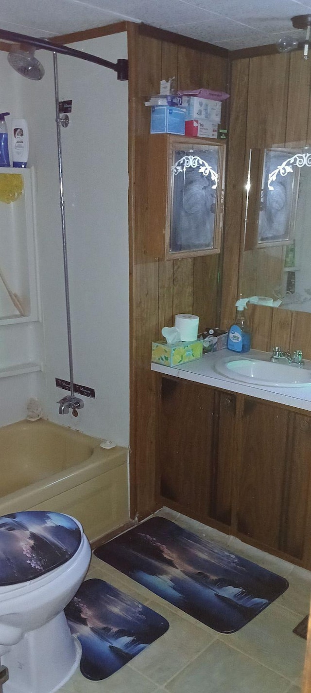 31314 500th St, Cass Lake, MN 56633 - bathroom with wood walls, vanity, and  shower combination