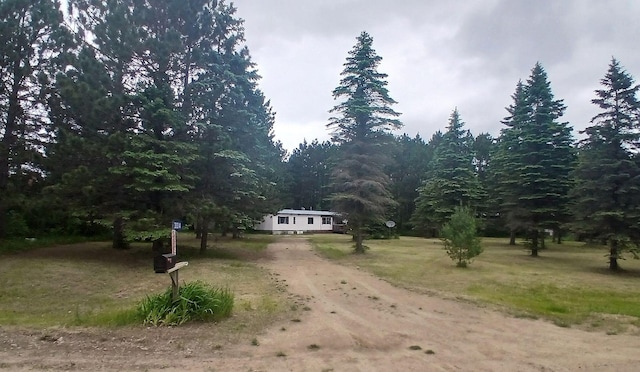 31314 500th St, Cass Lake, MN 56633 - view of dirt / gravel road with a view of trees