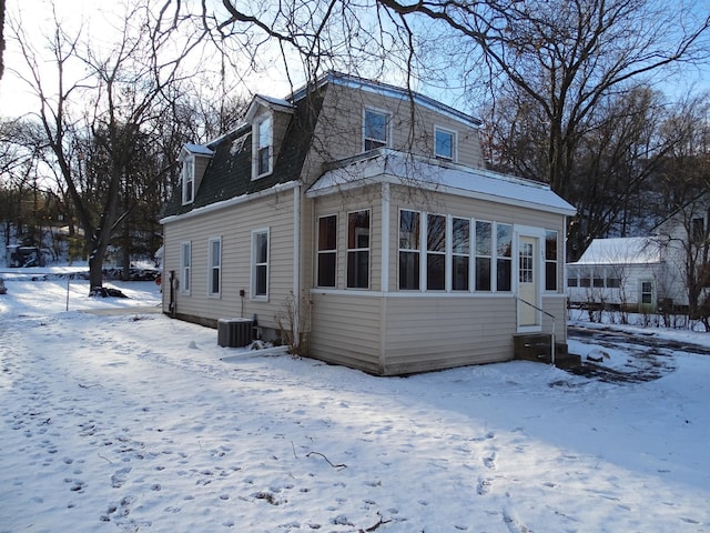 exterior space featuring cooling unit