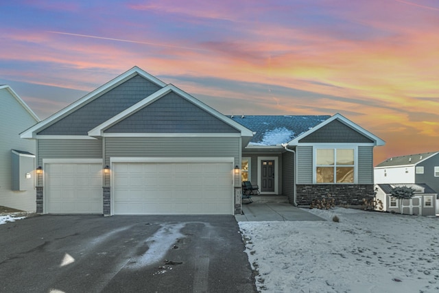 craftsman house featuring a garage