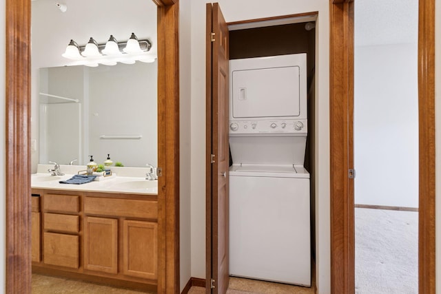clothes washing area with stacked washer and dryer, laundry area, light colored carpet, and a sink