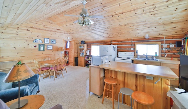 kitchen featuring vaulted ceiling, wooden ceiling, white electric range, and rustic walls