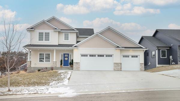 craftsman inspired home with a garage