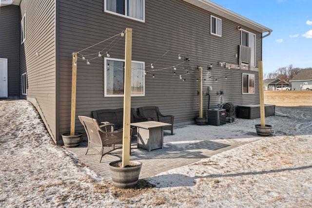 back of property featuring a patio