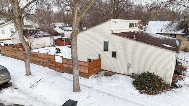 view of snow covered property