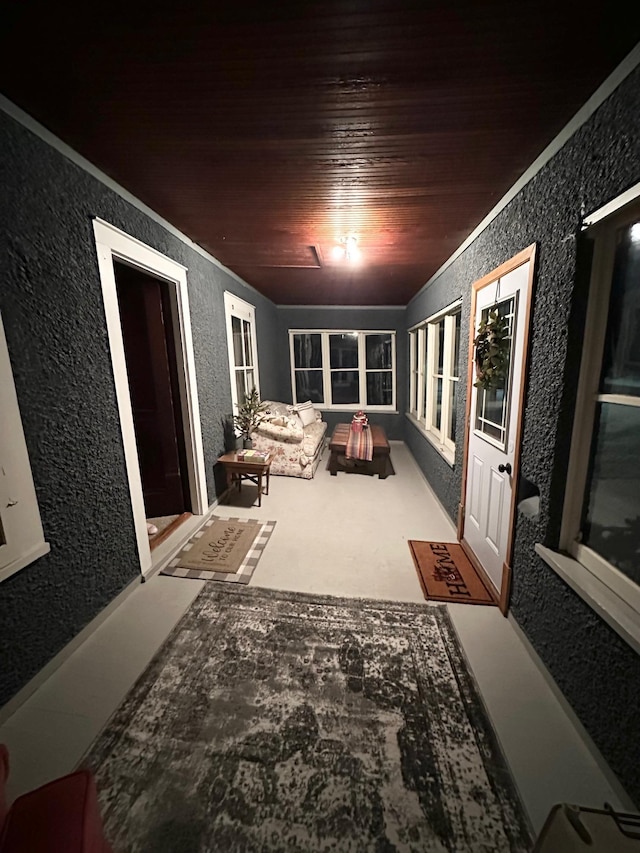 sunroom with wooden ceiling