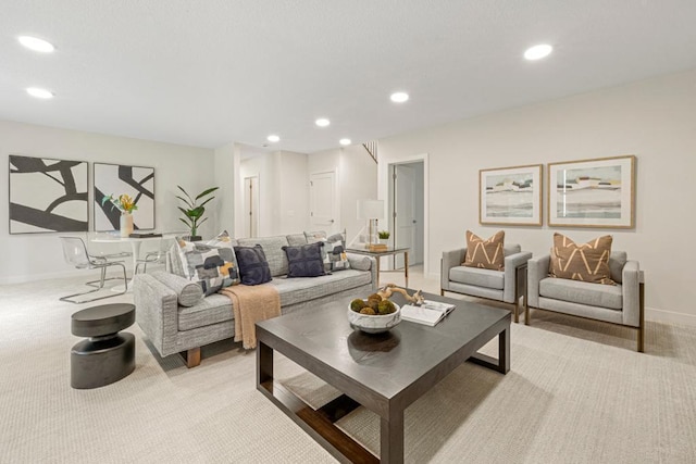 living room with light colored carpet