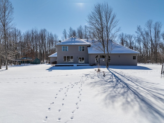 view of snow covered property