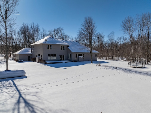 view of snow covered house