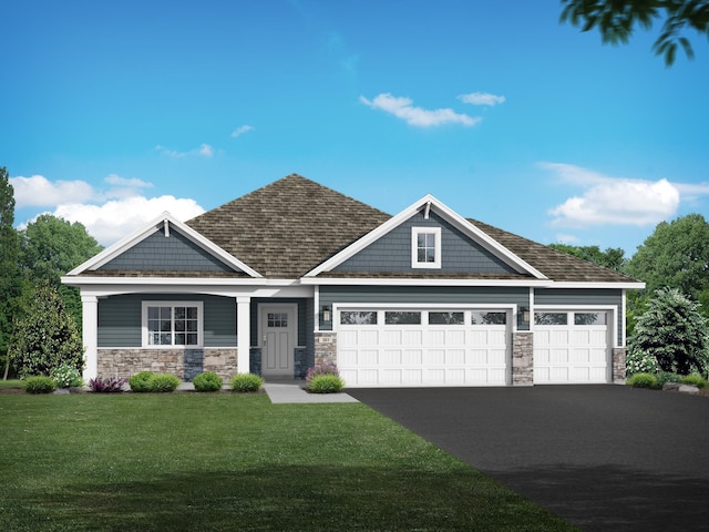 craftsman house with a garage and a front yard