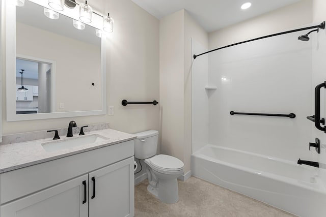 full bathroom featuring shower / bathing tub combination, vanity, and toilet