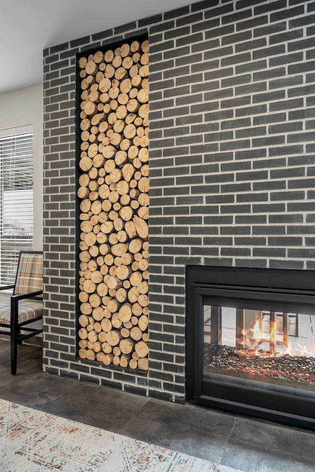 interior details featuring a large fireplace